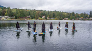 Bellingham Herald image of witches paddling